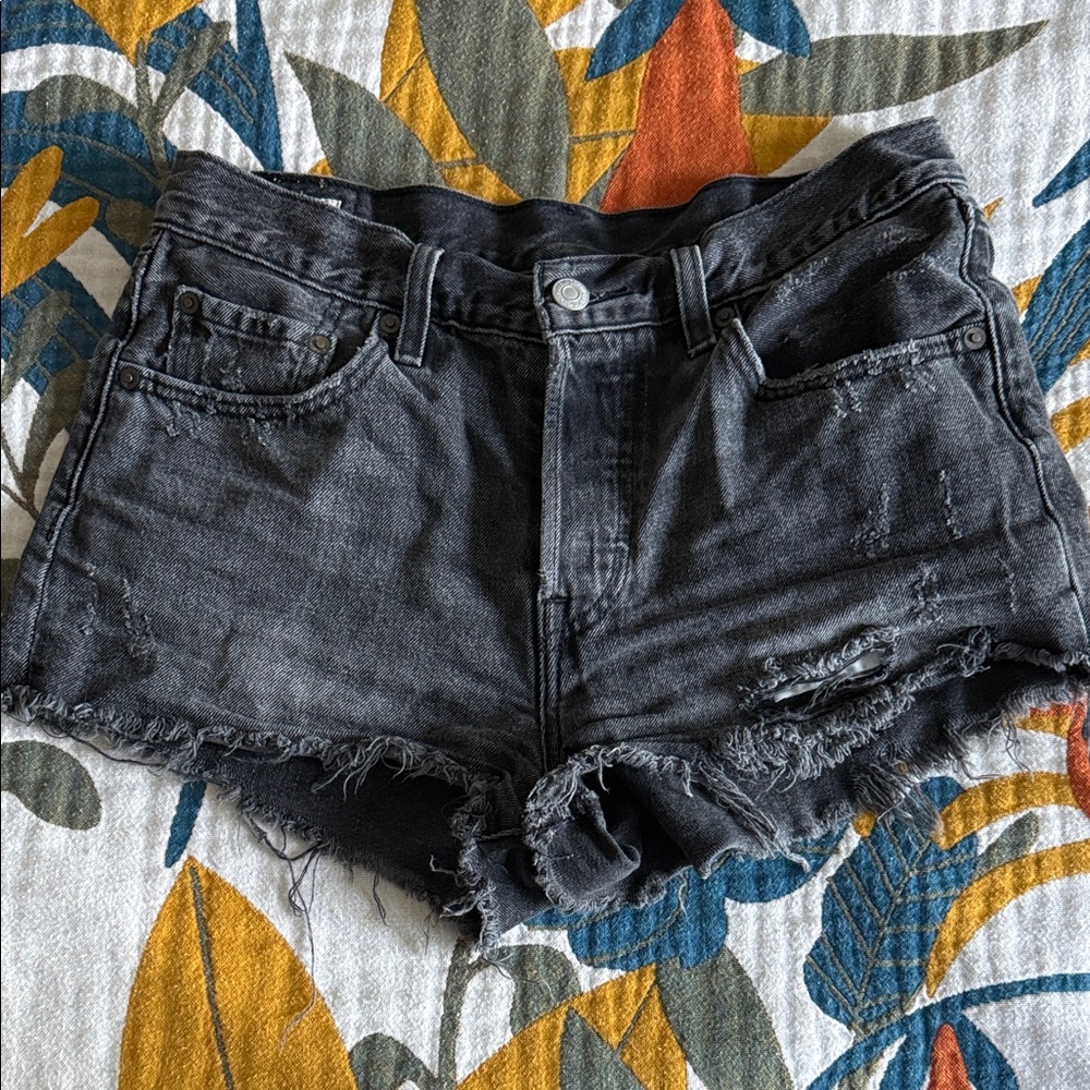 Levi’s Distressed Black Denim Shorts